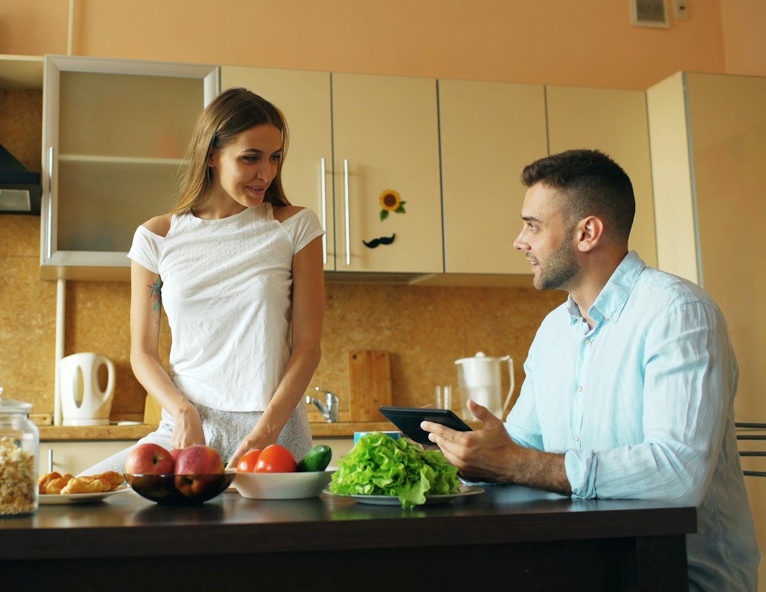 Couple preparing a healthy meal at home
